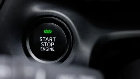 The engine start and stop button for modern car engine ignition. Keyless tech Stock Photos