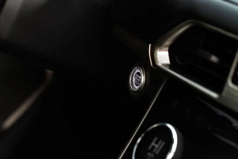 Engine start button close up. Car engine start button. Stock Photos