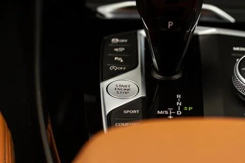 Engine start button. Close up engine car start stop button. Modern car interi Stock-Fotos