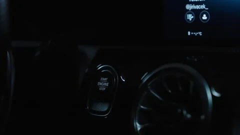 Engine start button in modern car interior Stock Footage 345665866