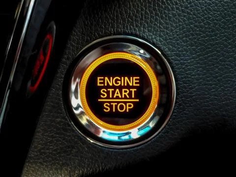 Engine Start or stop button in a conventional modern car. Car instrument pa.. Stock Photos