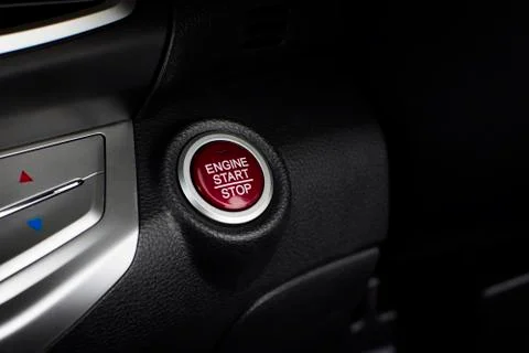 Engine start / stop button of luxury car, automotive part concept. Stock Photos