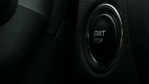 Engine start stop button from a modern car interior Stock Footage 70083717
