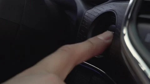 Engine start stop button from a modern car interior 動画素材 209613589