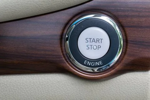 Engine start stop button from a modern car interior Foto stock