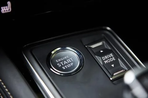 Engine Start Stop button of a modern car Stock Photos