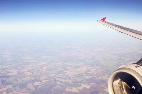 Engine under the wing of the aircraft. Stock Photos