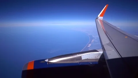 Engine Wing airplane sky concept. View of engine plane from window airplane see Stock Footage 91985913