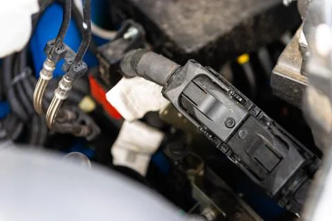 Engine wiring and electronic control module close-up Stock Photos
