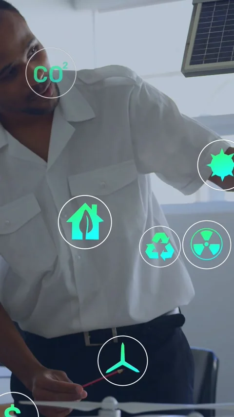 Engineer adjusting drone model and pointing, causing green icons around solar Stock Footage 330332514