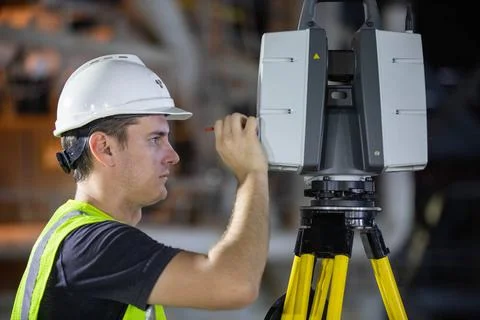 An engineer adjusts equipment from the Design Visualization Lab set up ins... Stock Photos