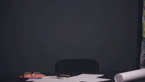 Engineer after work, sits in a chair Stock-Footage 81268229