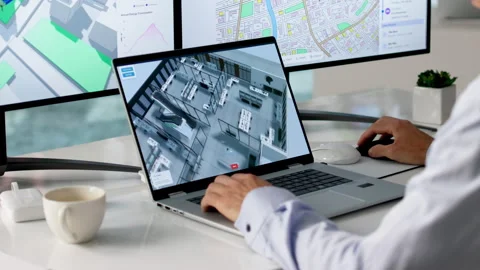 Engineer Analyzes Urban Property Maps Using BIM Stock Footage 335456030
