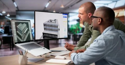 Engineer And Architect Collaborate On Digital 3D Building Model Design. Stock Photos