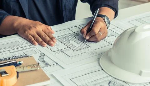 Engineer and Architect concept, Engineer Architects working with blueprints. 写真素材