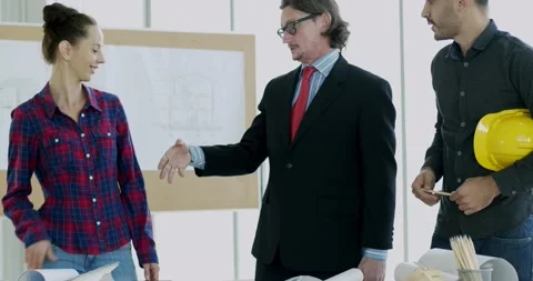 Engineer and architect manager planning on table in office Stock Footage 140031599