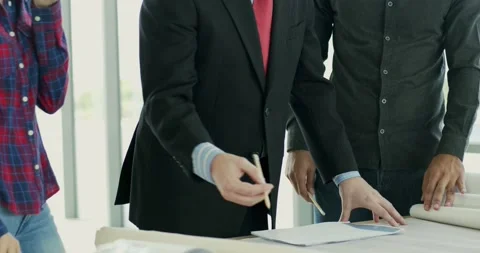 Engineer and architect manager wearing face mask planning on table Stock Footage 139956522