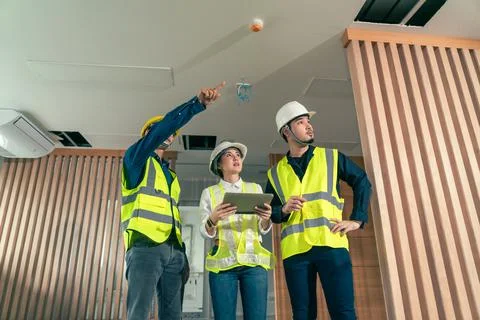 Engineer and architect working discussion plan in construction process interi Stock Photos