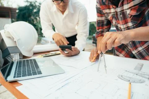 Engineer and architect working with new project. Stock Photos