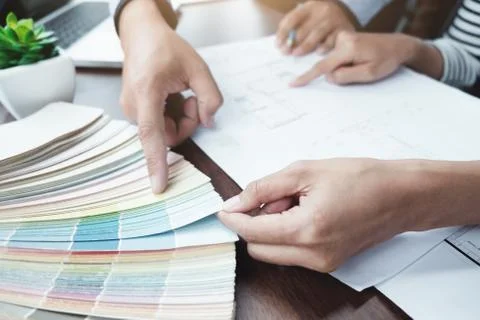 Engineer and architecture select color for house project. Stock Photos