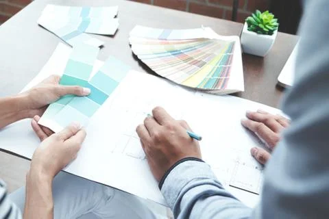 Engineer and architecture select color for house project. Stock Photos