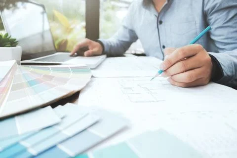 Engineer and architecture select color for house project. Stock Photos