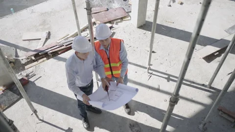 Engineer and Construction supervisor inspecting the construction site. Stock Footage 170416358