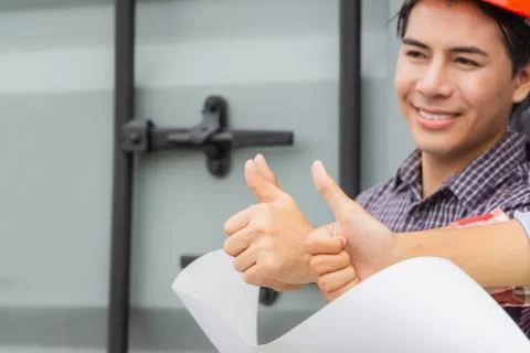 Engineer and factory worker man team smiling with giving thumbs up Фото