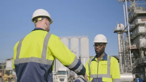Engineer and inspector shaking hands Stock Footage 114326616