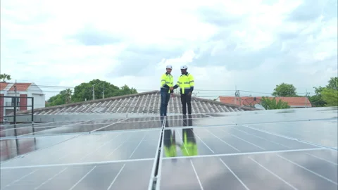 Engineer and technician inspects solar panel installation and test Video stock 282757272