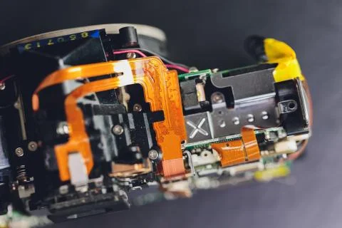 Engineer and technician Minitures are fixing camera mirror box assembly Stock Photos