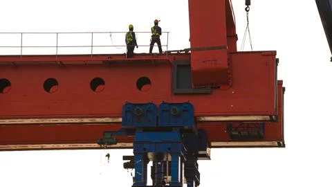Engineer and worker are working build sky hiway on crane construction. Stock Photos