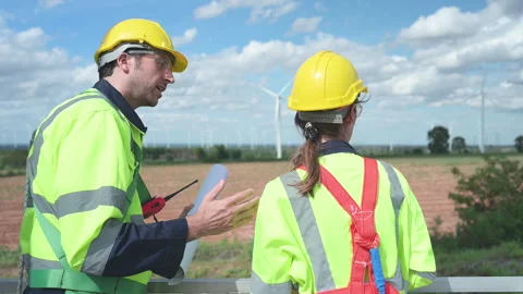 Engineer and worker discussing the project on the background Stock Footage 253985718