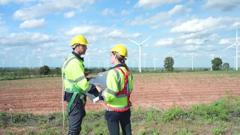 Engineer and worker discussing the project Stock Footage 253988646