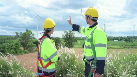 Engineer and worker discussing the project on the background Stock Footage 253998350