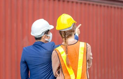Engineer and worker team checking containers box from cargo, Logistic and team Fotos Stock