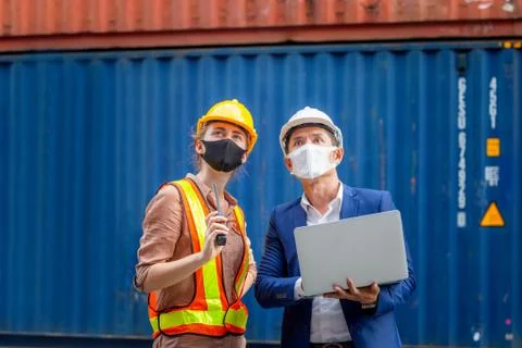 Engineer and worker team checking containers box from cargo, Logistic concept Stockfoto's