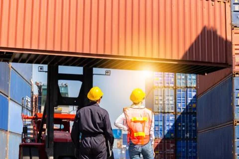 Engineer and worker team checking containers box from cargo, Logistic concept 写真素材