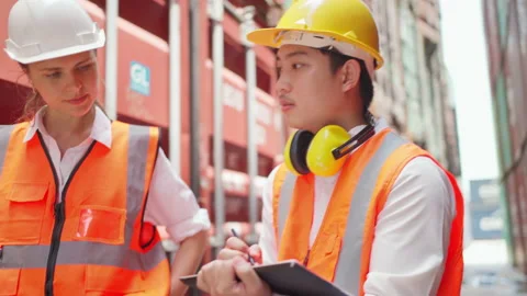 Engineer and worker walking inspector the container Stock Footage 197549616