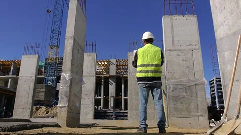 Engineer, architect adjusts the plan or project Stock Footage 242590494
