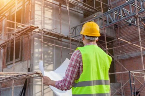 Engineer architect on a building construction site Foto stock