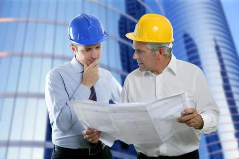 Engineer architect two expertise team plan hardhat Stock Photos