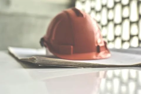 Engineer architecture concept.Helmet on work table Stock Photos