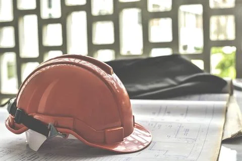 Engineer architecture concept.Helmet on work table Stock Photos