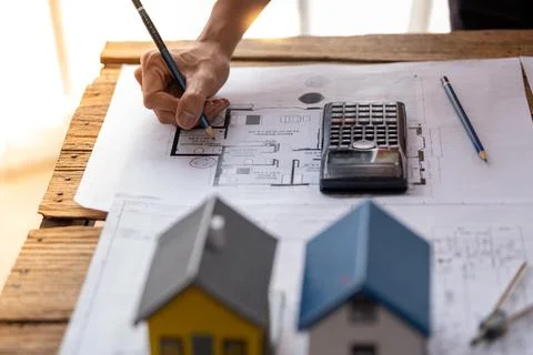 Engineer are helping to design work on blueprints, engineer people meeting Stock Photos