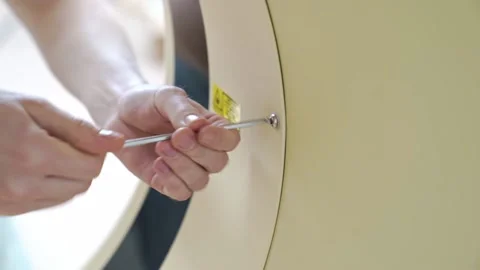Engineer assembles medical equipment after repair, installation, maintenance. 스톡 동영상 163449495