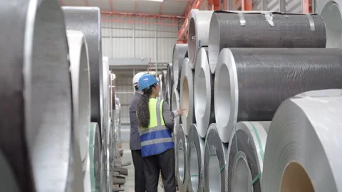 Engineer Auditing Metal Coil Production in an Industrial Factory Stock Footage 342637905