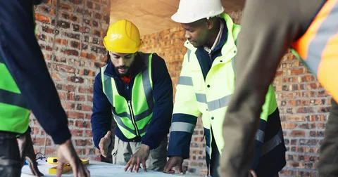 Engineer, blueprint and architect with team in discussion, meeting or plann.. Stockfoto's