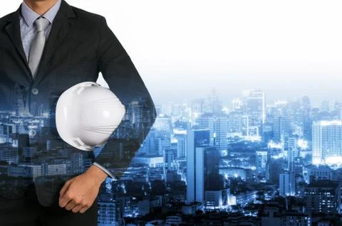 Engineer with blurred industrial. Stock Photos