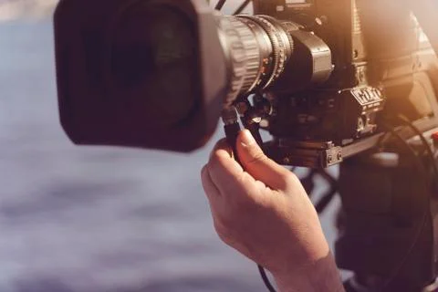 Engineer broadcasting control camera shoting live. Blur background 스톡 사진